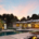Luxury home with pool at dusk
