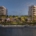 Water Club St. Pete Beach towers and waterfront lawn at dusk, artist rendering