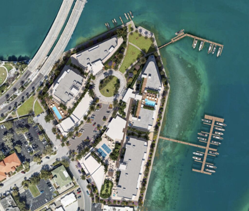 Aerial site plan of Water Club St. Pete Beach on Boca Ciega Bay with marina docks, artist rendering